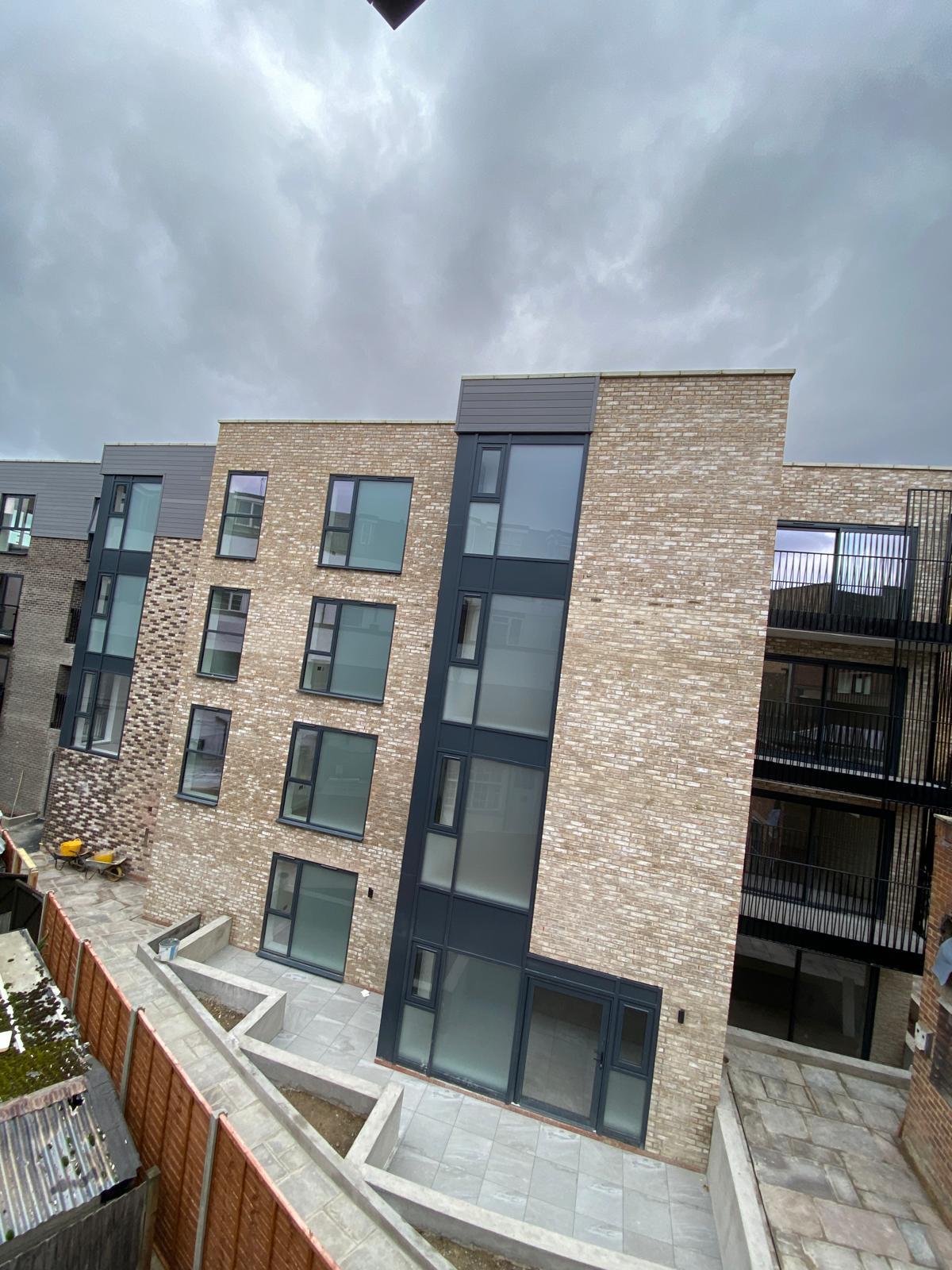Rear elevation complete with landscaping to the terrace level.