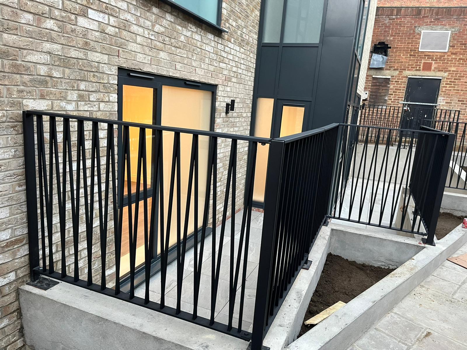 Black metal balustrades installed to the private terraces.