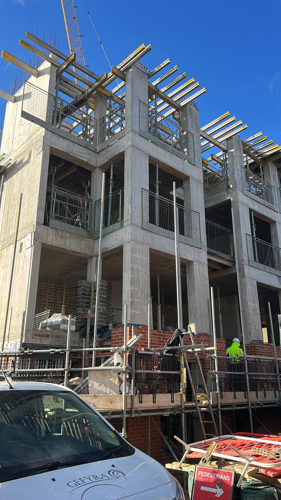 Close view of concrete columns, slabs and edge structure under construction