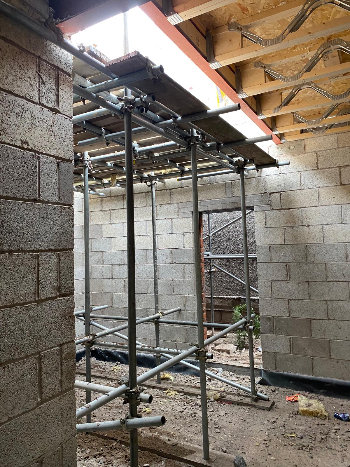 Internal blockwork walls under construction.