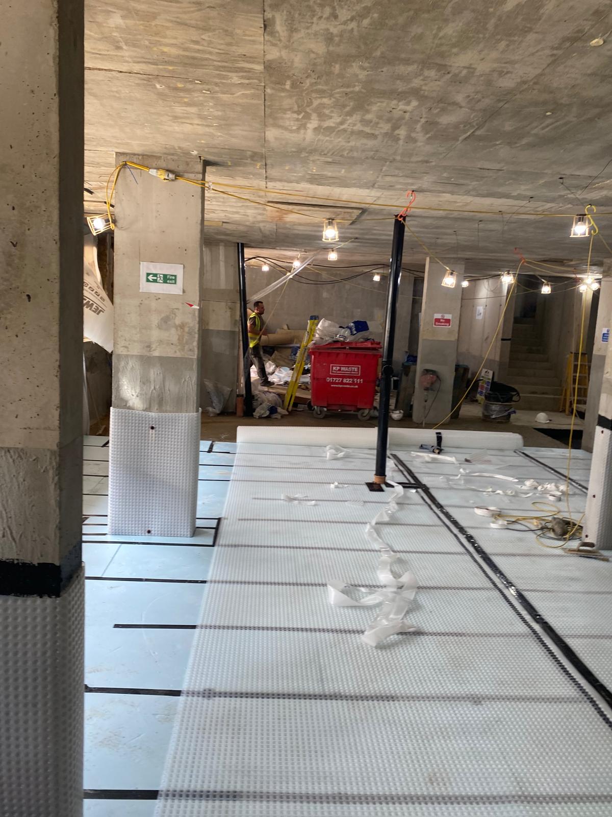 Underfloor heating and floor build up progressing.
