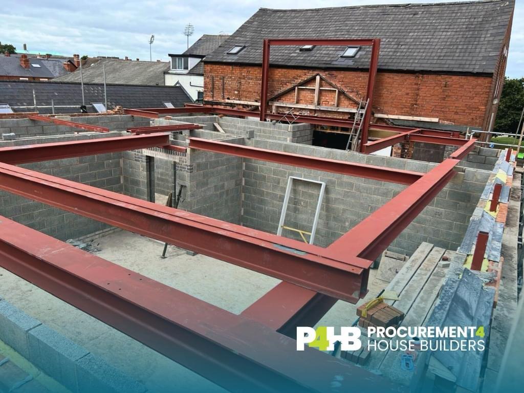 Structural steel frame installed at first floor.