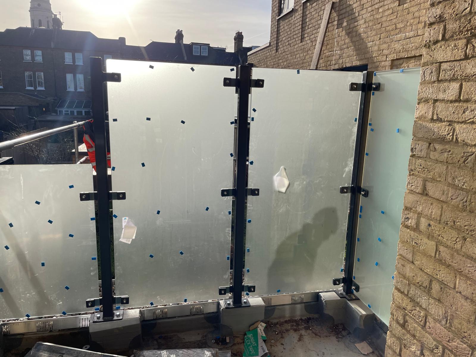 Frosted glass balustrades installed to the terraces.
