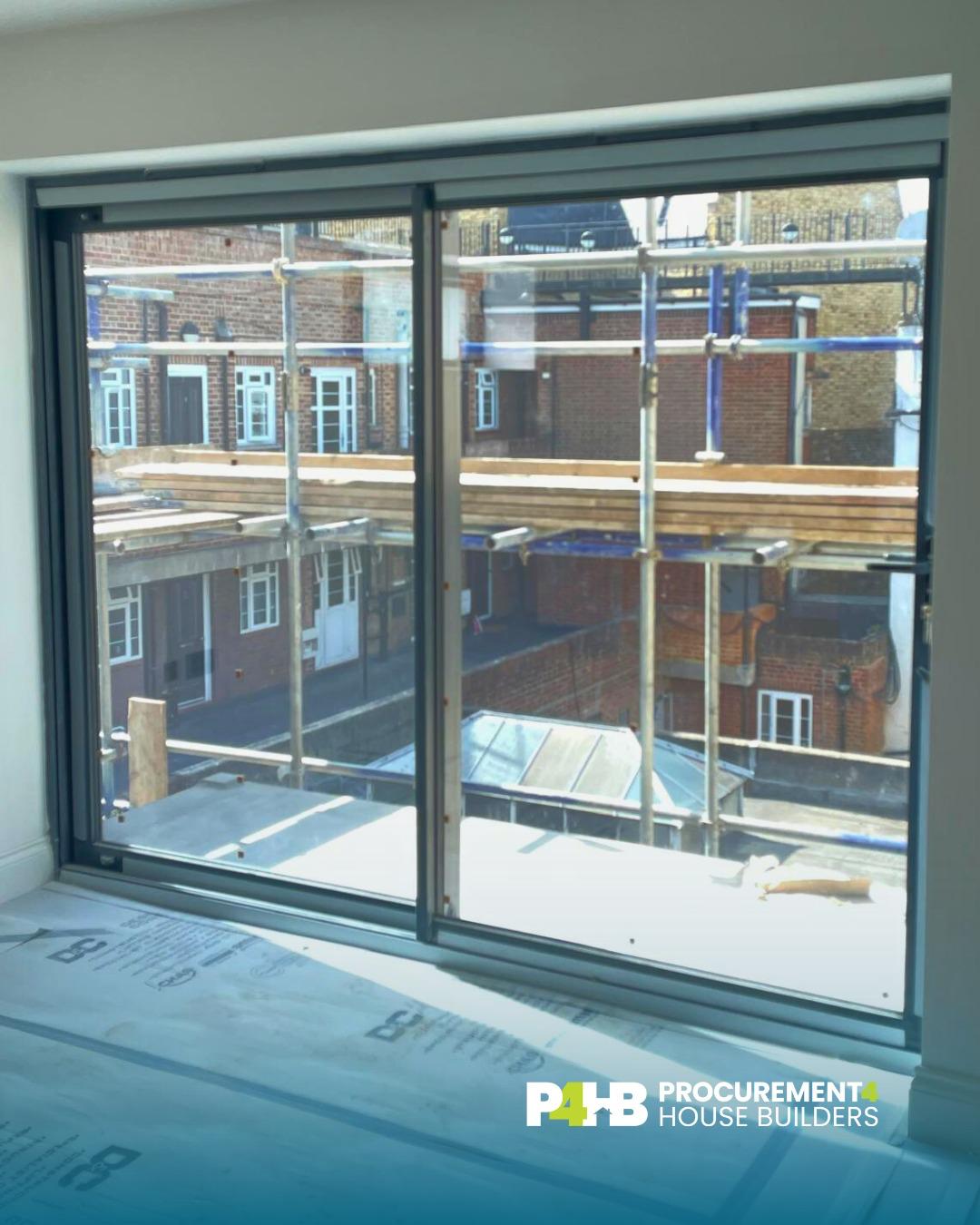 Glazing installed, with the external scaffold still in place.