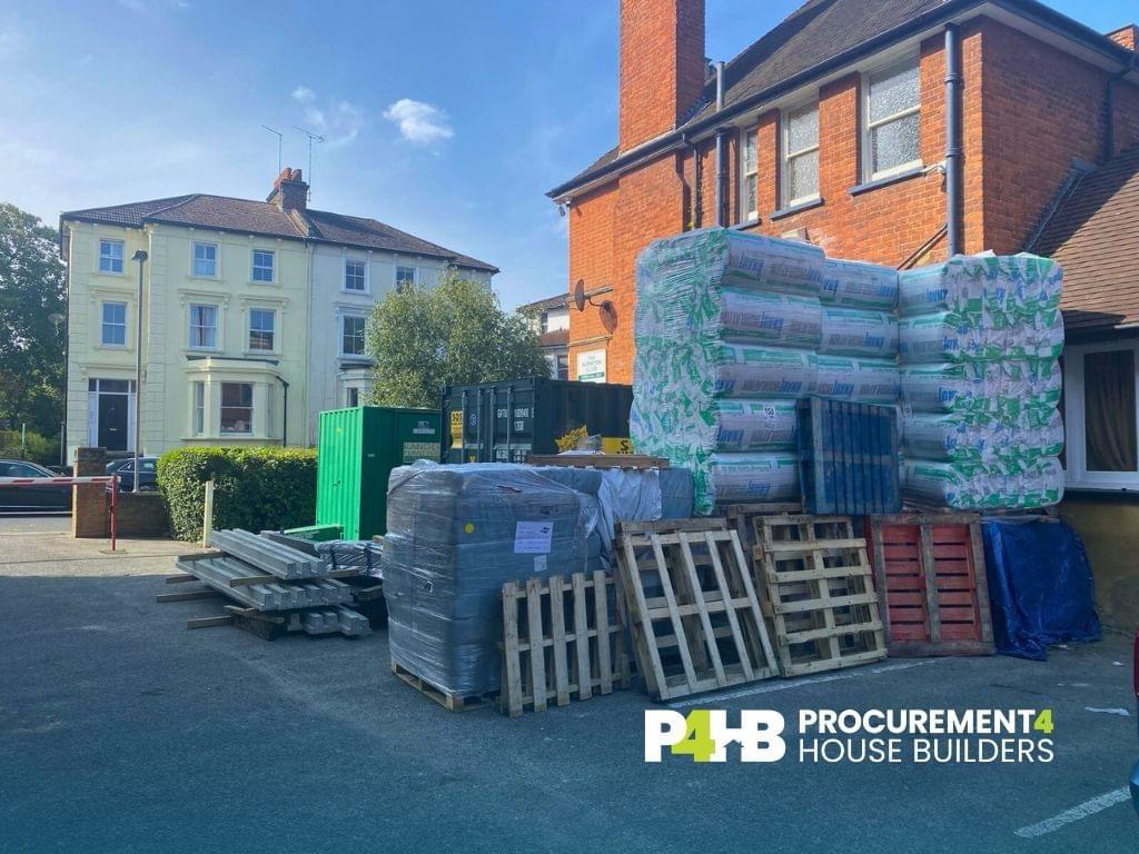 Insulation and palletised materials delivered to site.
