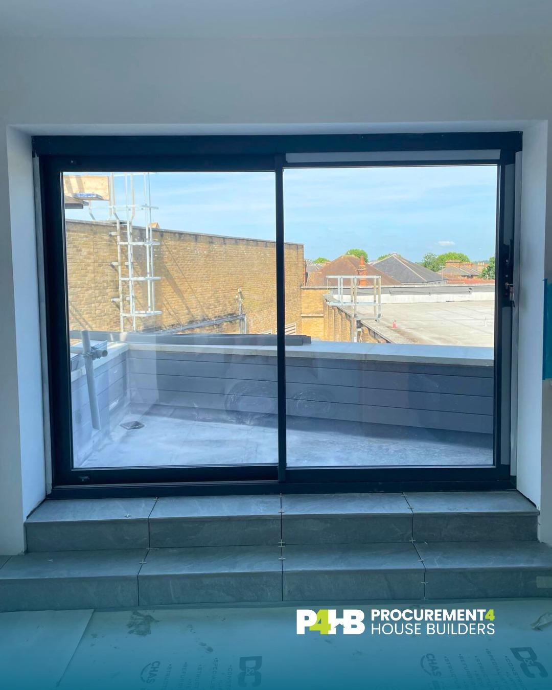 Sliding doors and terrace threshold completed.