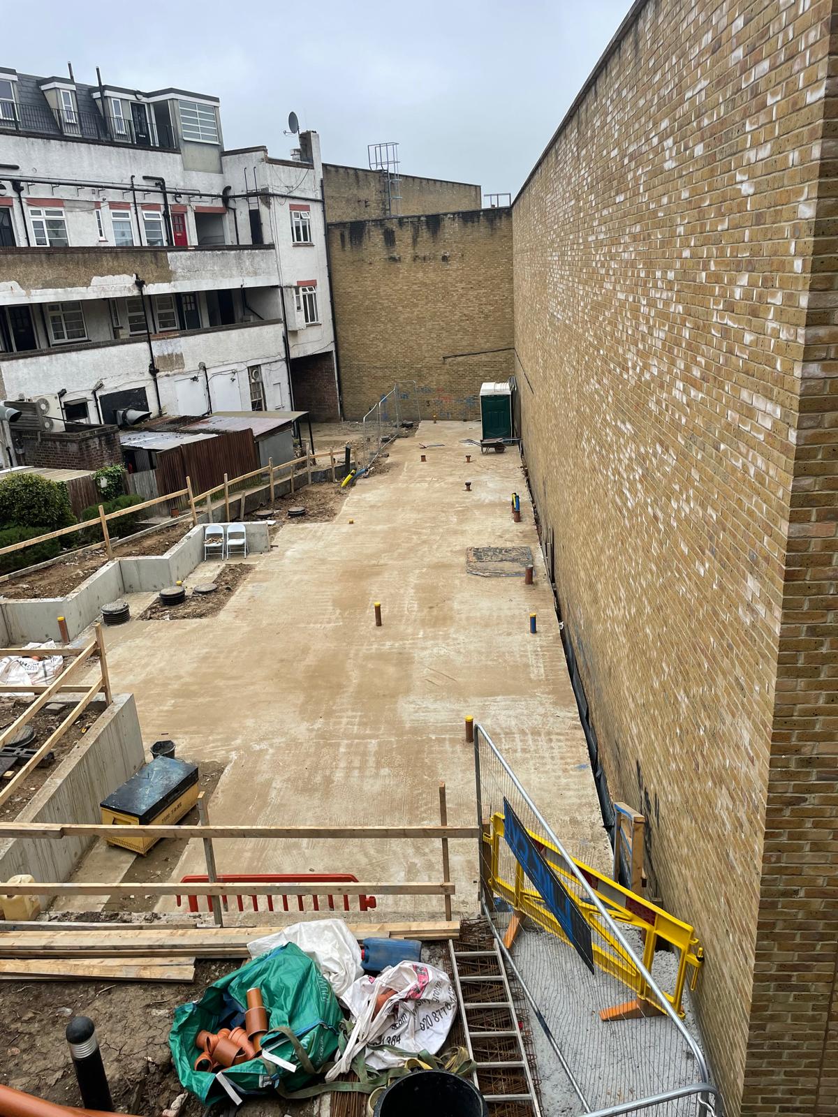 Ground slab poured between the existing party walls.