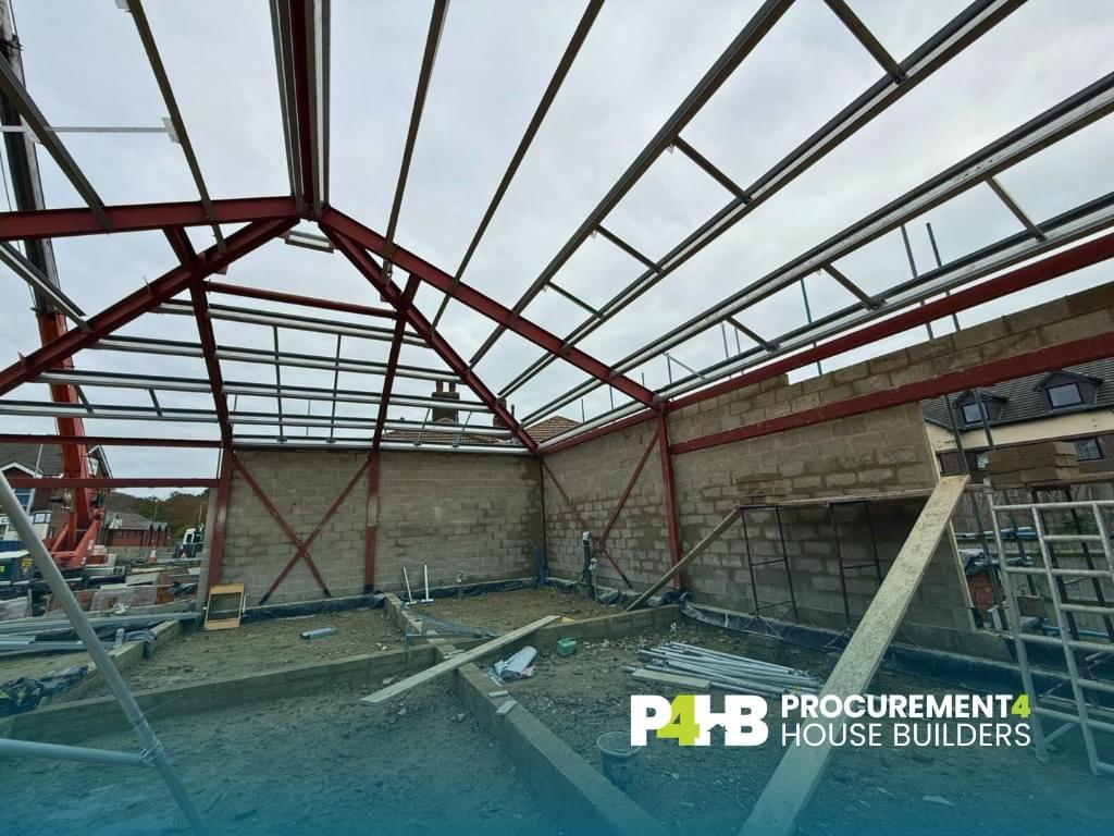 New steel roof structure taking shape.