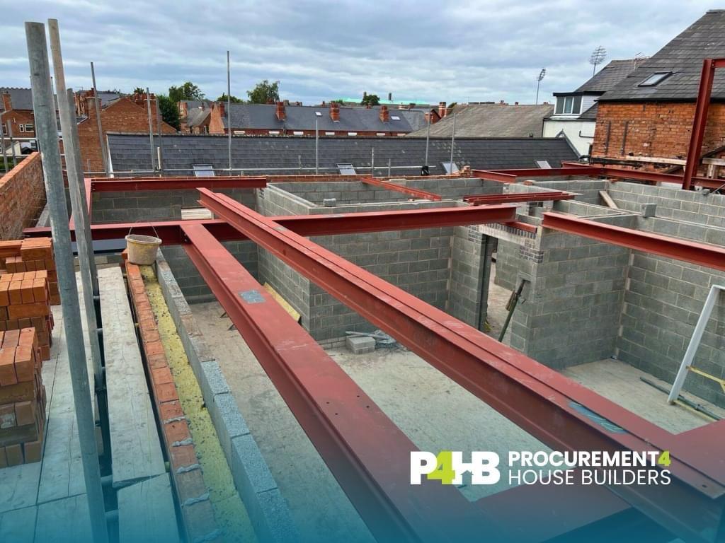 First floor steel beams landed on the blockwork structure.